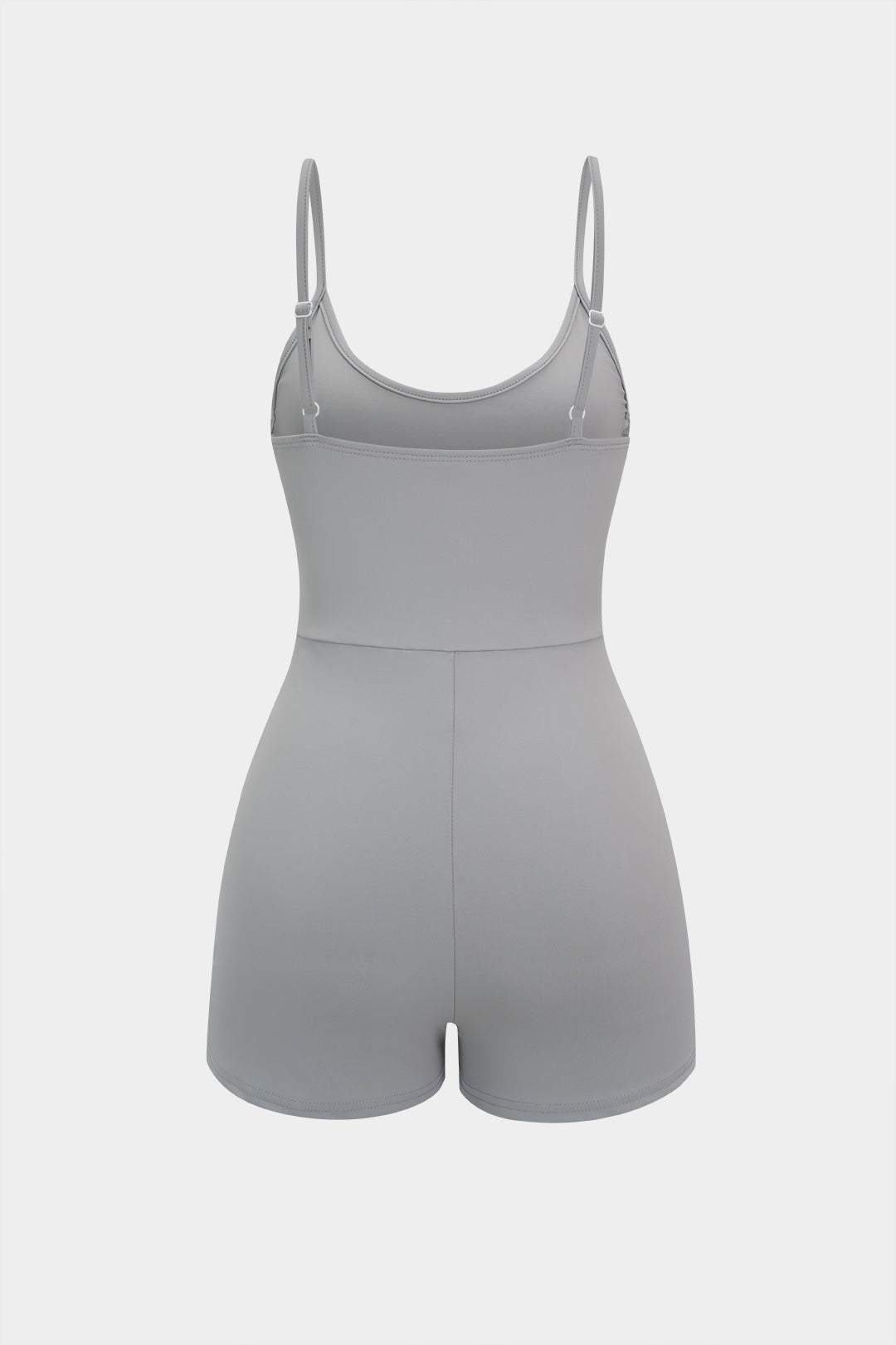Effen asymmetrische playsuit met ronde hals