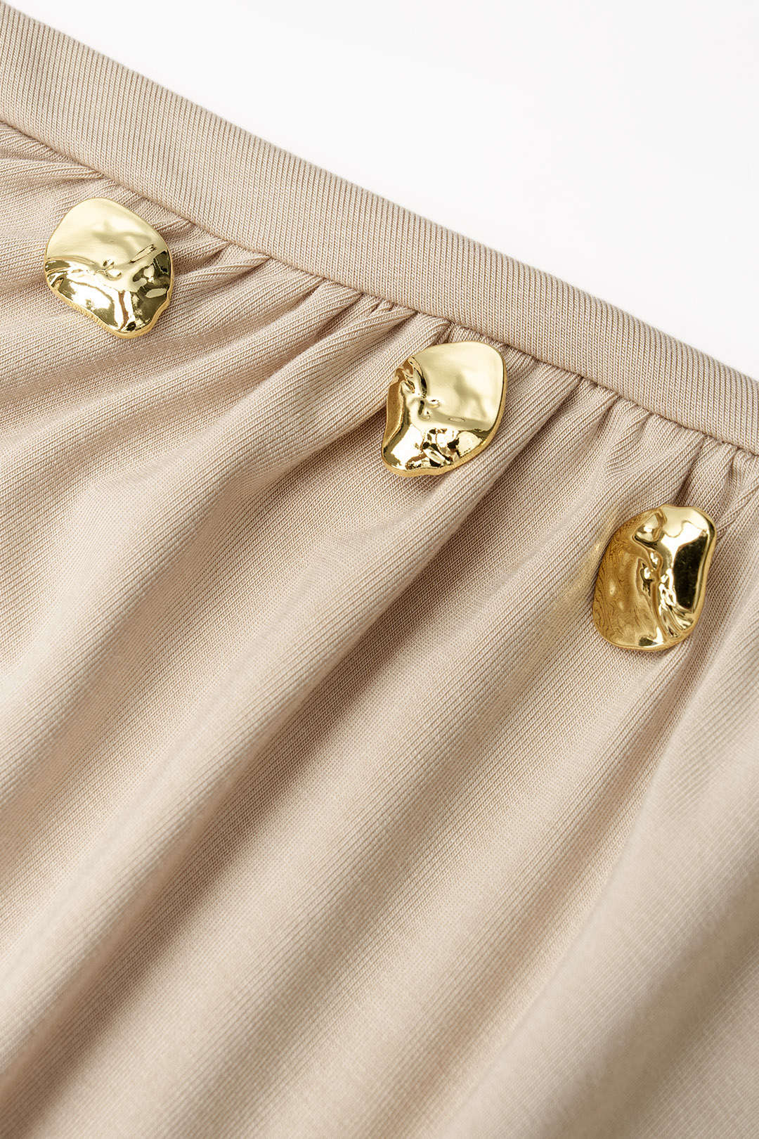Metallic top met ruches en lange mouwen