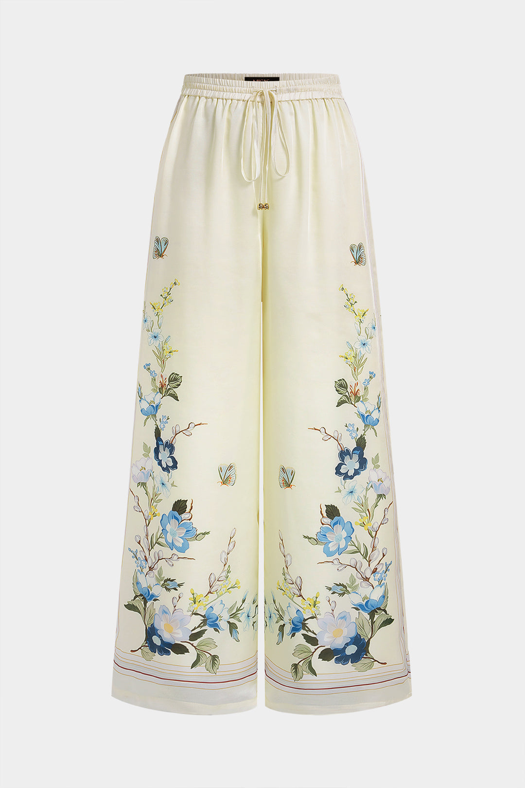 Bloemenprint metallic broek met strik en knoopjes