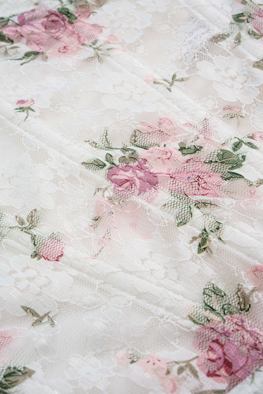 Bloemenprint transparante body met spaghettibandjes