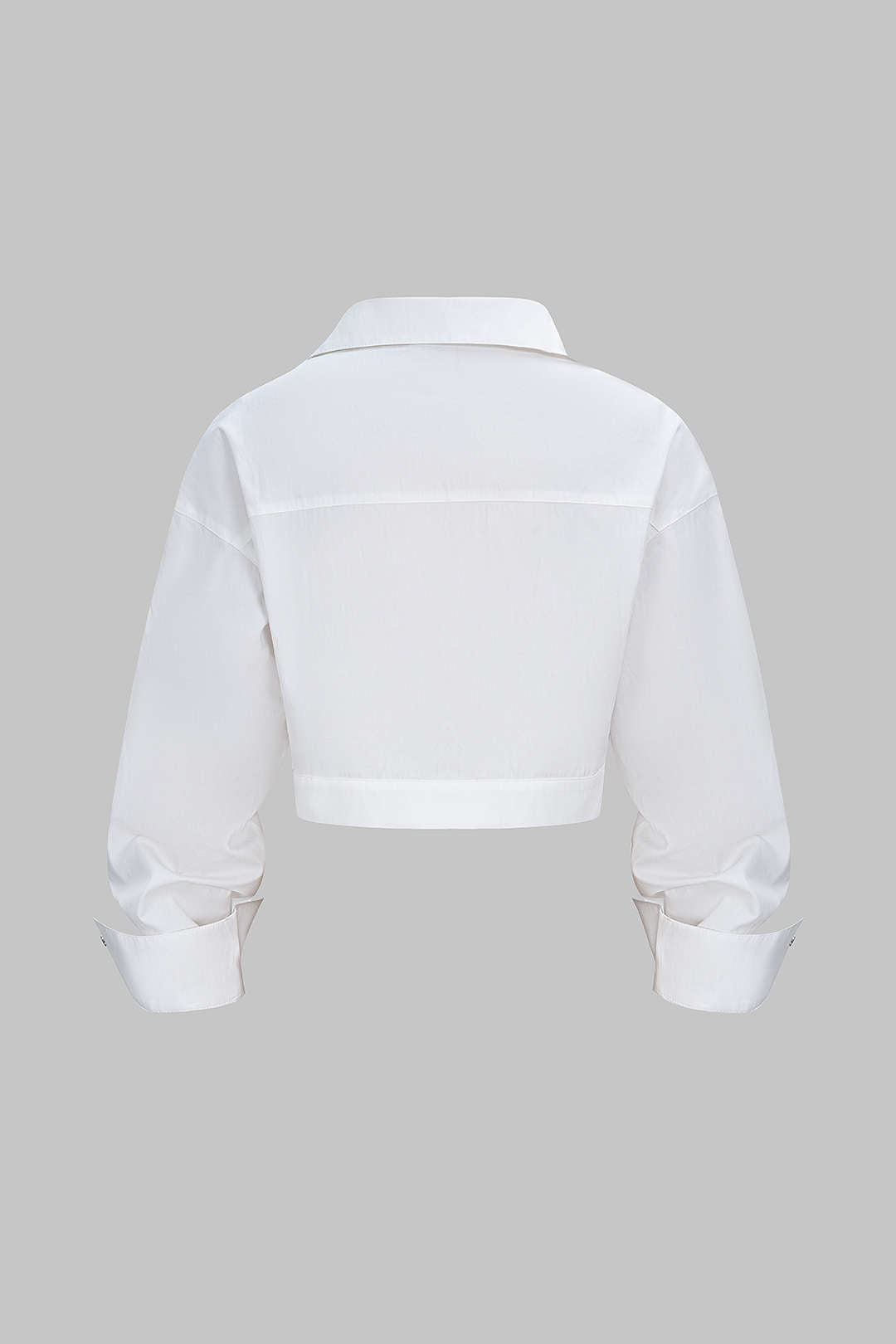 Asymmetrische blouse met rits en lange mouwen
