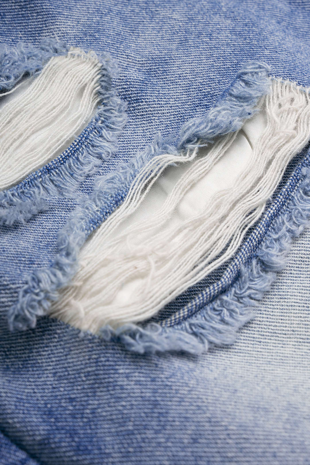 Denim short met rafelrand, rits en hoge taille