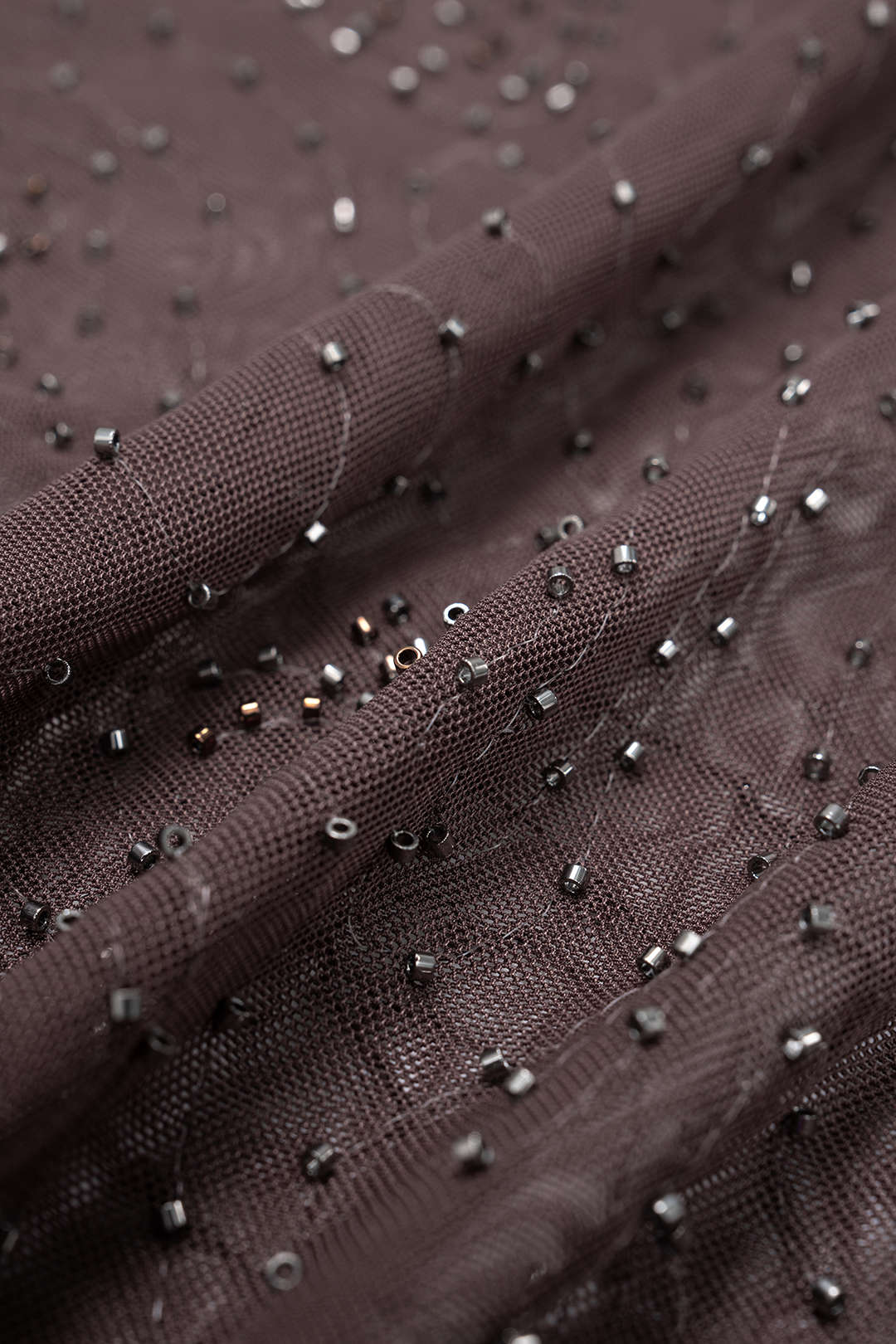 Mesh broek met kralen en smokwerk