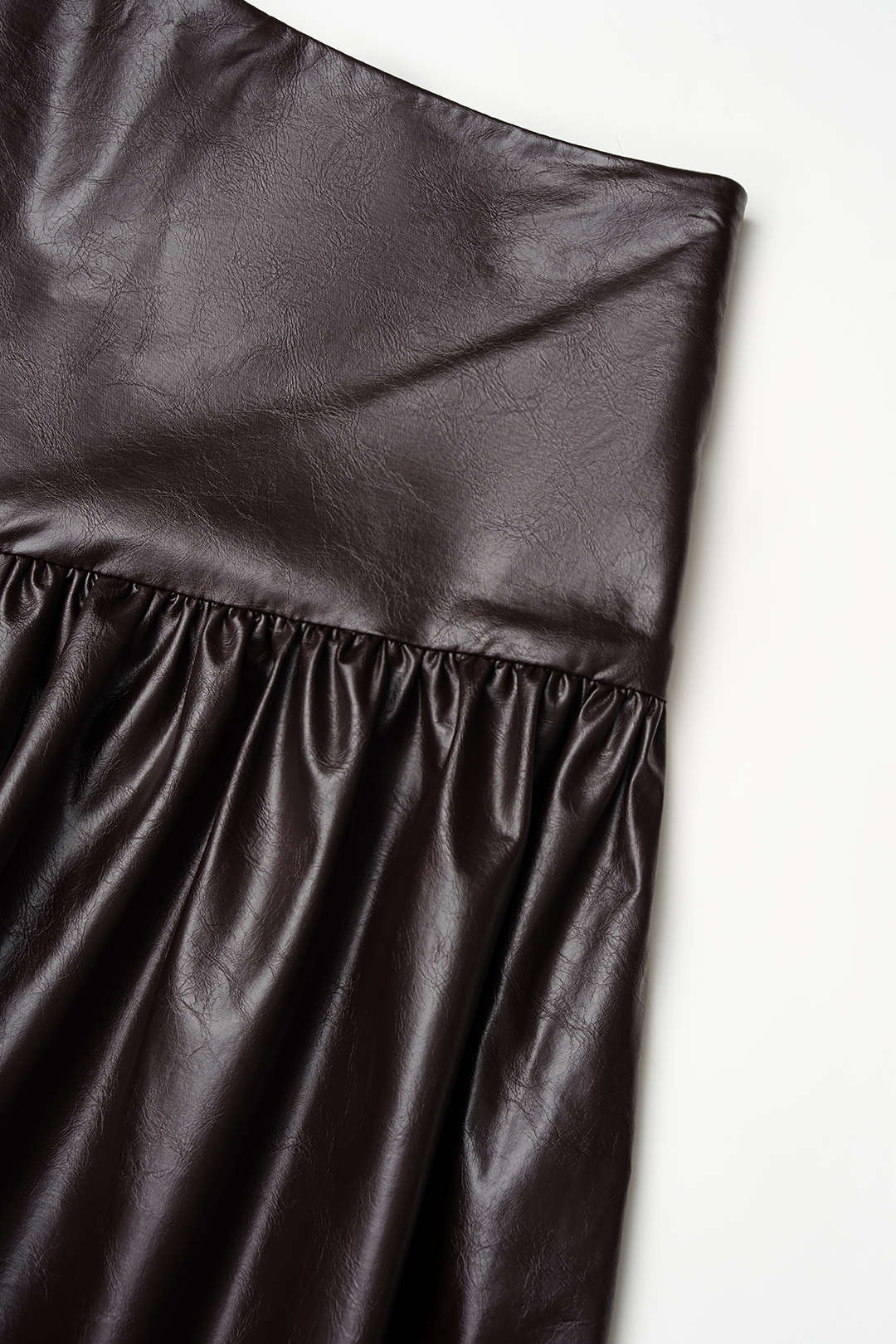 Leren-look asymmetrische broek met ballonmodel