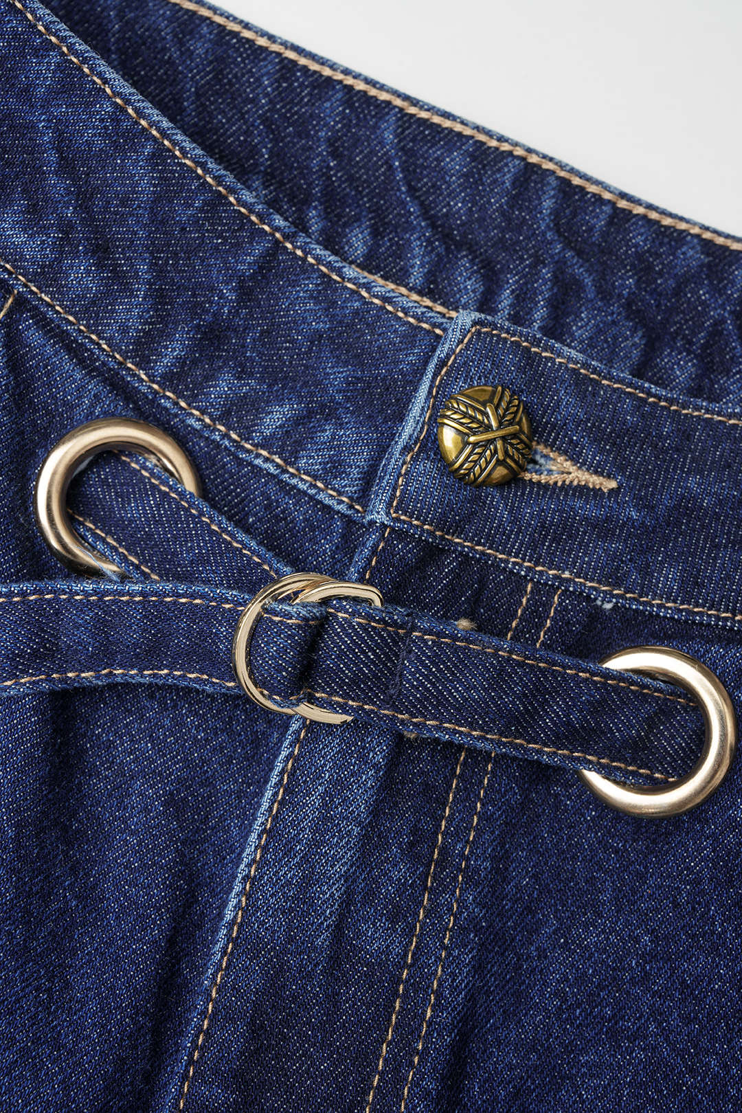 Metallic jeans met riem en rits