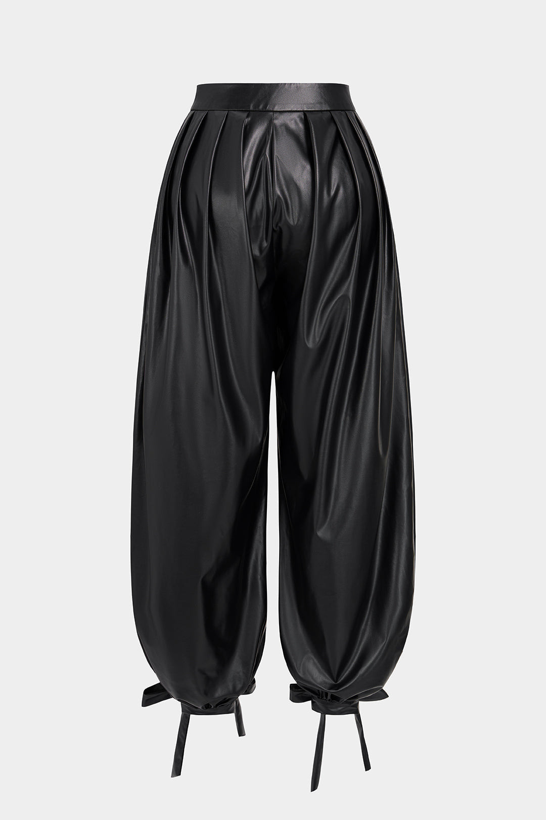 Leren-look broek met knoopjes, ruches en strik