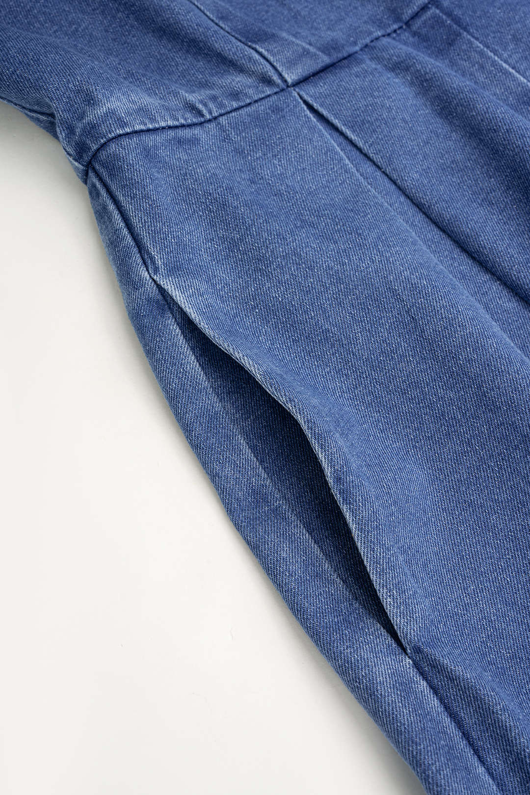Denim mouwloze jumpsuit met spaghettibandjes