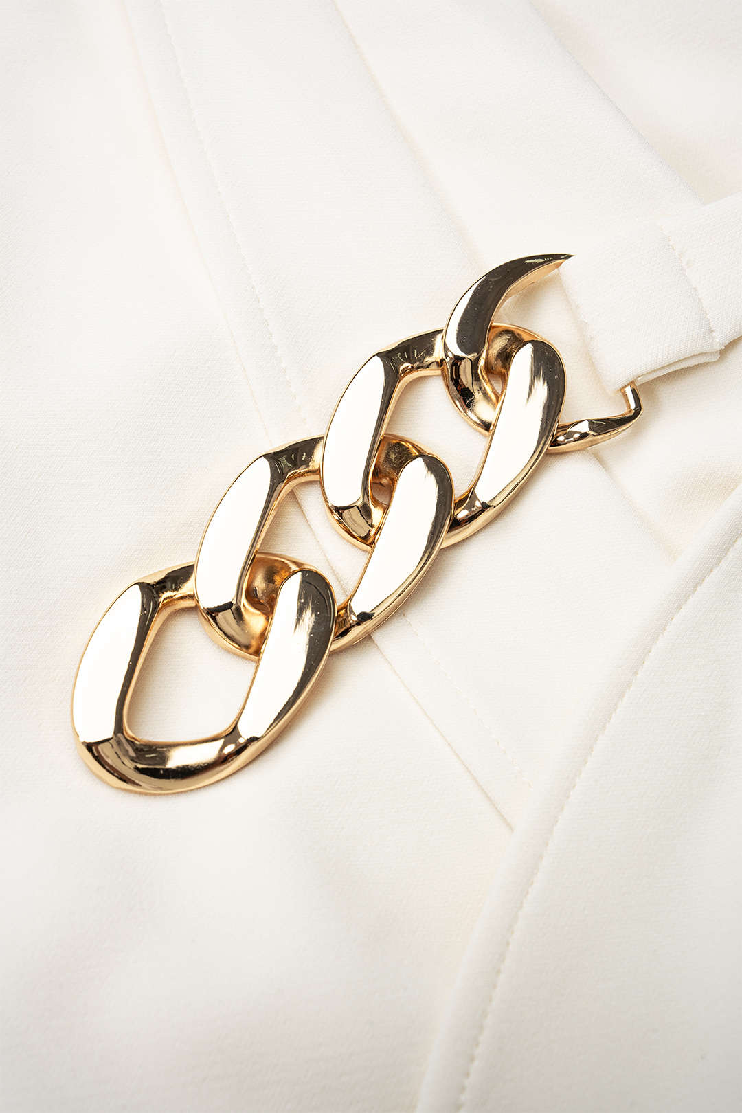 Metallic top met kettingdetail en ruches