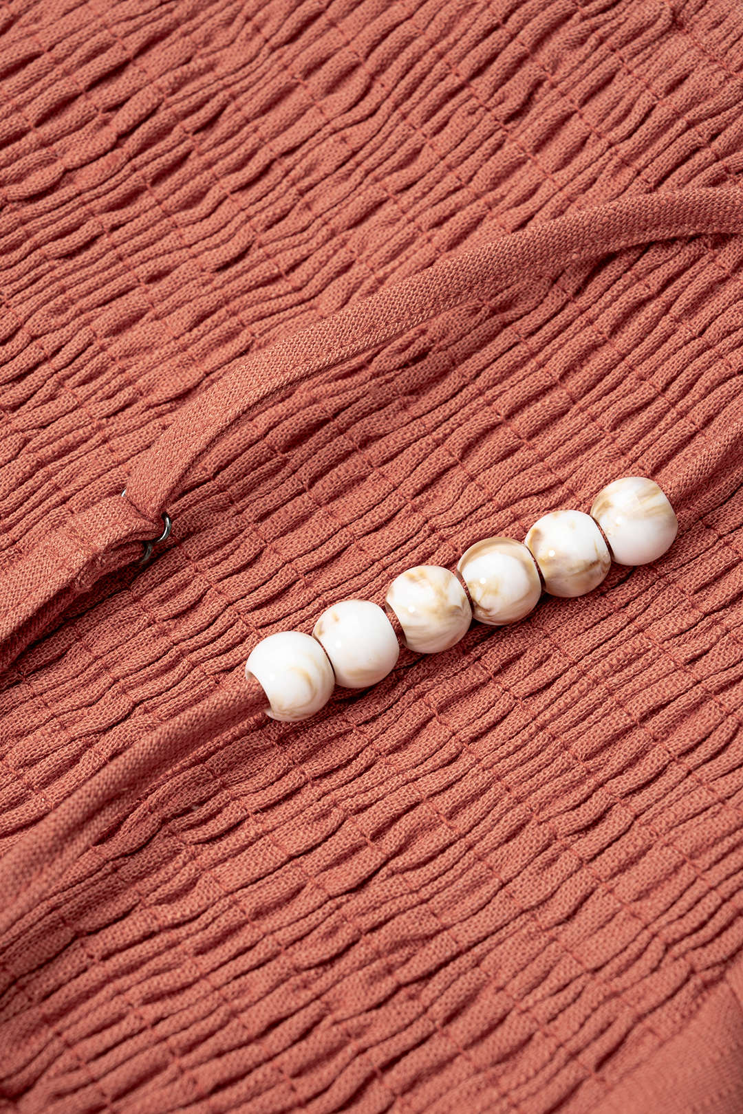 Asymmetrische top met kralen