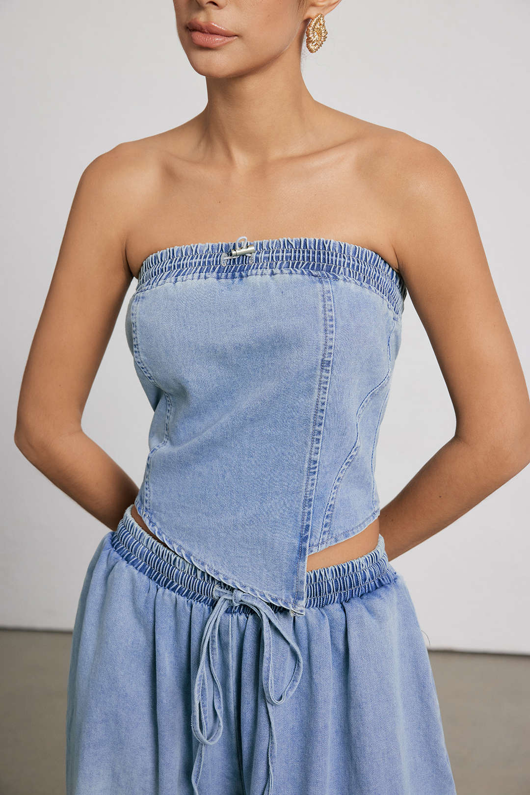 Demi - Denim set met strapless top en jeans