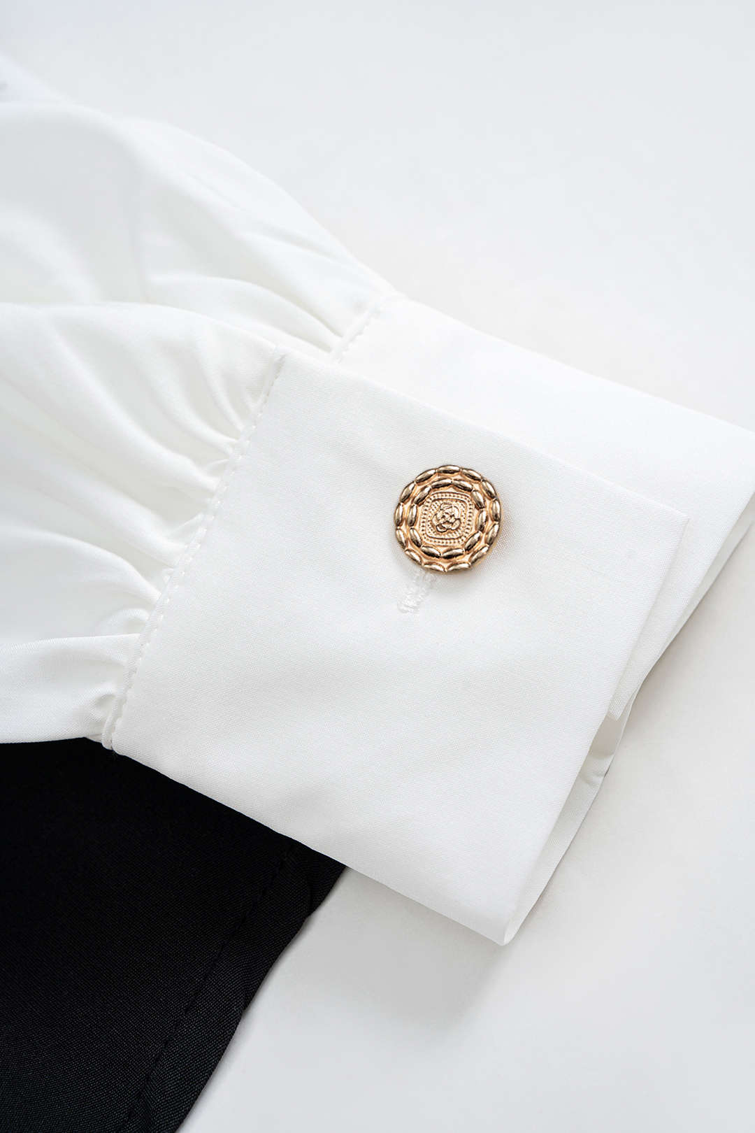 Metallic geplooide blouse met V-hals en lange mouwen