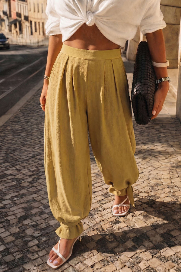 Broek met ruches en strik