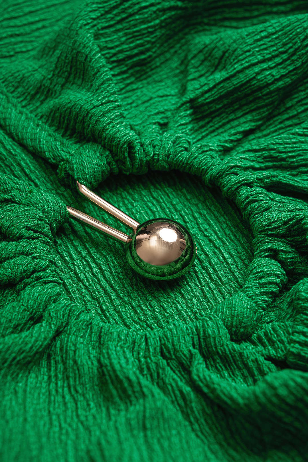 Gestructureerde asymmetrische top met ronde hals en ruches