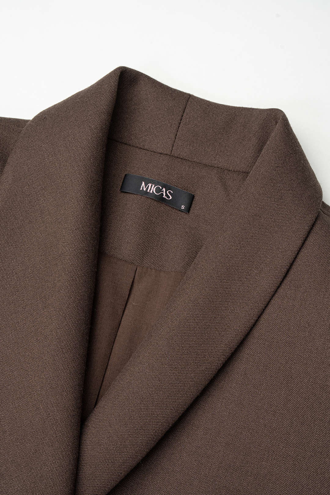 Metallic asymmetrische blazer met strik