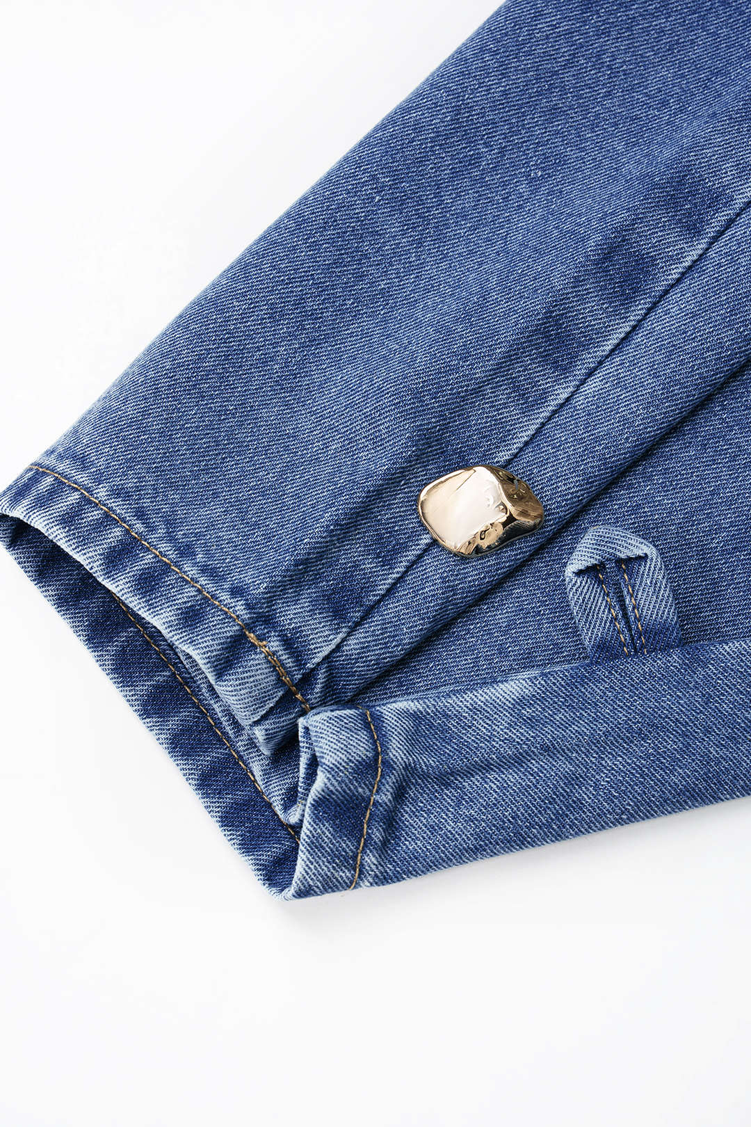Metallic jeans met knoopjes, zakken en ballonmodel