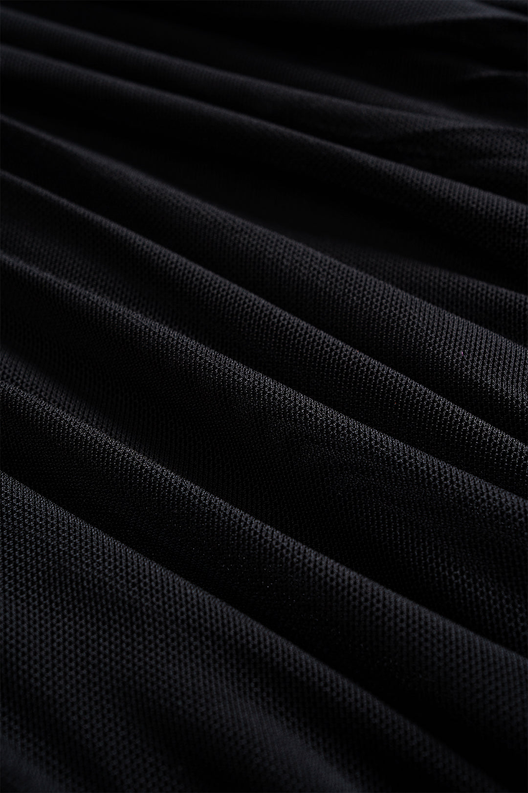 Asymmetrische mesh minijurk met ruches