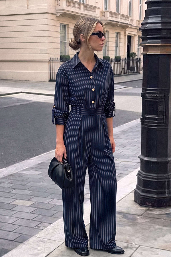 Patchwork metallic jumpsuit met knoopjes en lange mouwen