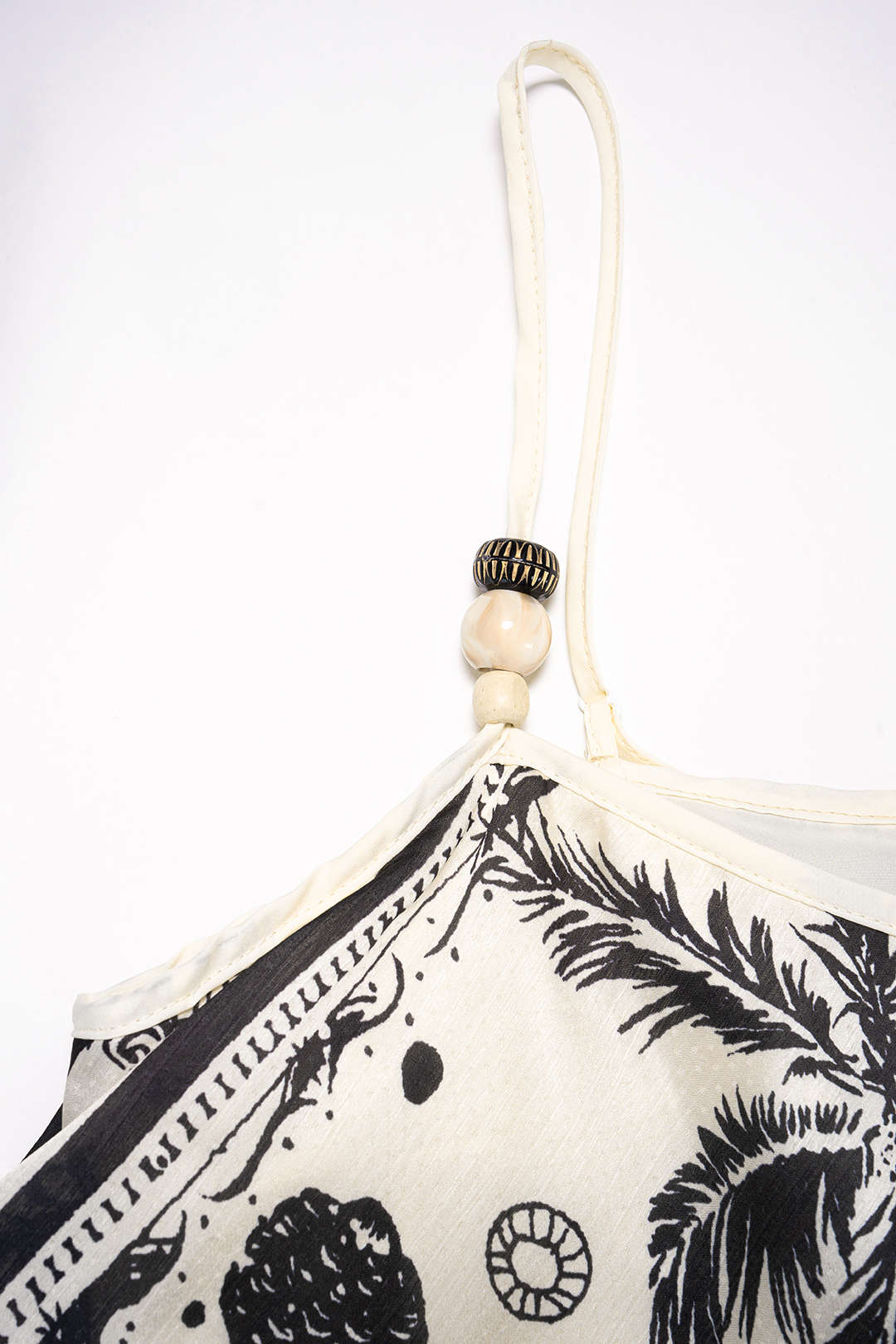 Patchwork mouwloze midijurk met pailletten en kralen