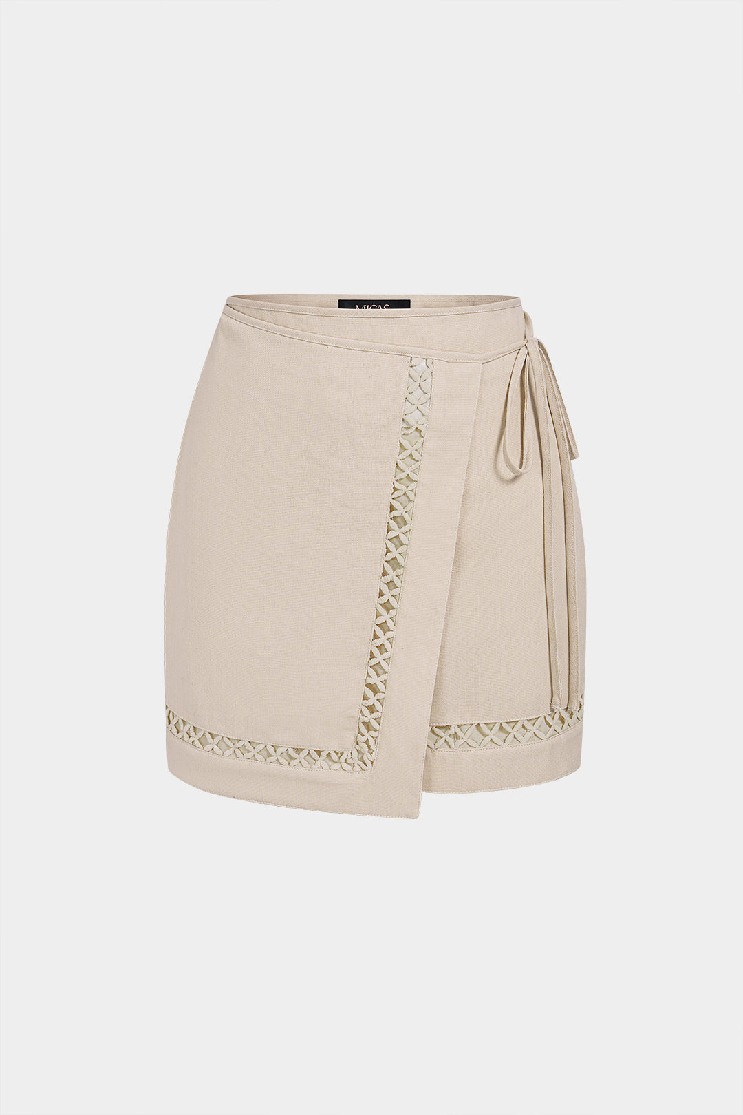 Asymmetrische minirok met kanten rand, uitsnijding en strik