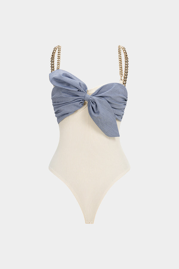 Patchwork metallic body met kettingdetail en knoopdetail