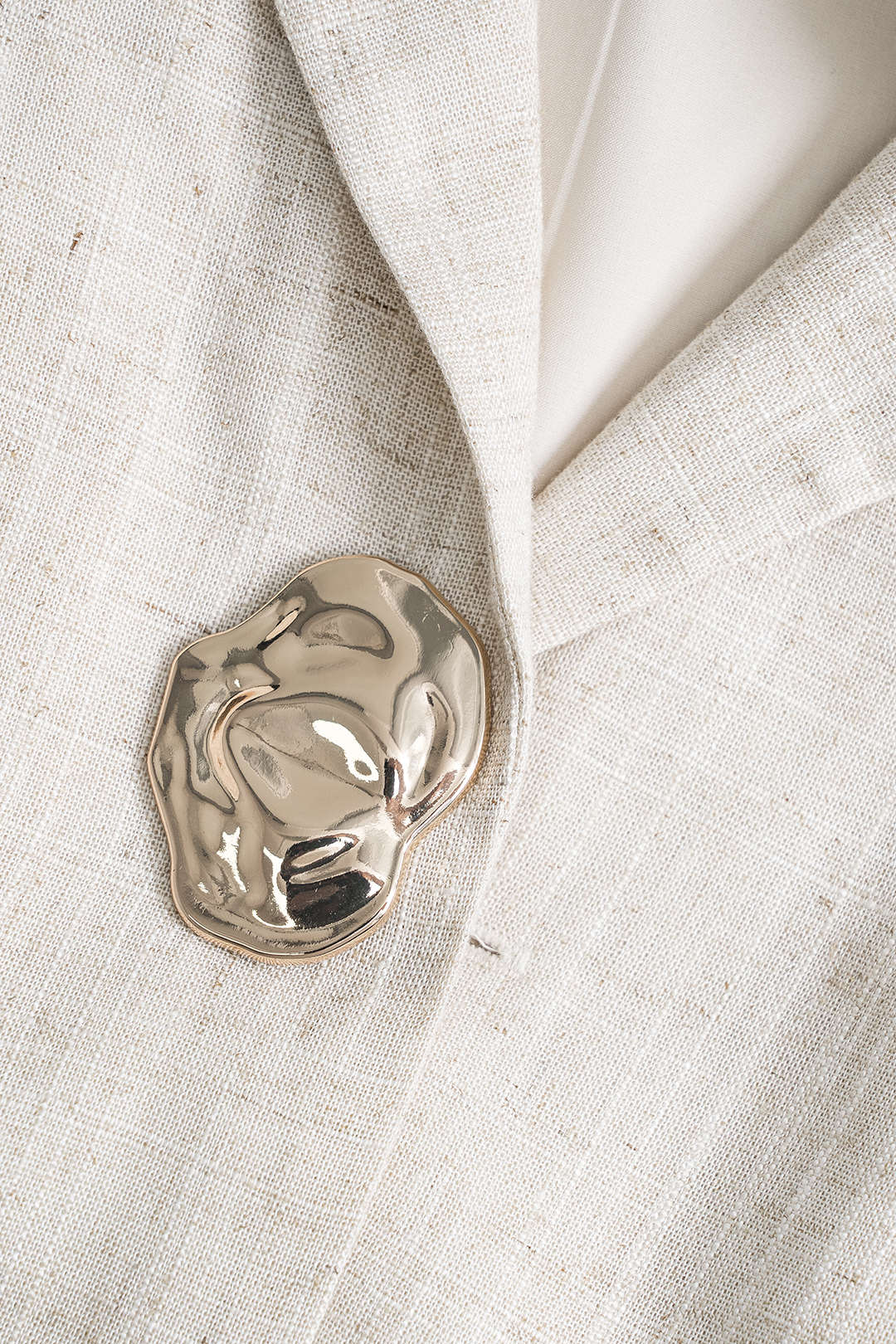 Linnen metallic blouse met knoopjes en korte mouwen