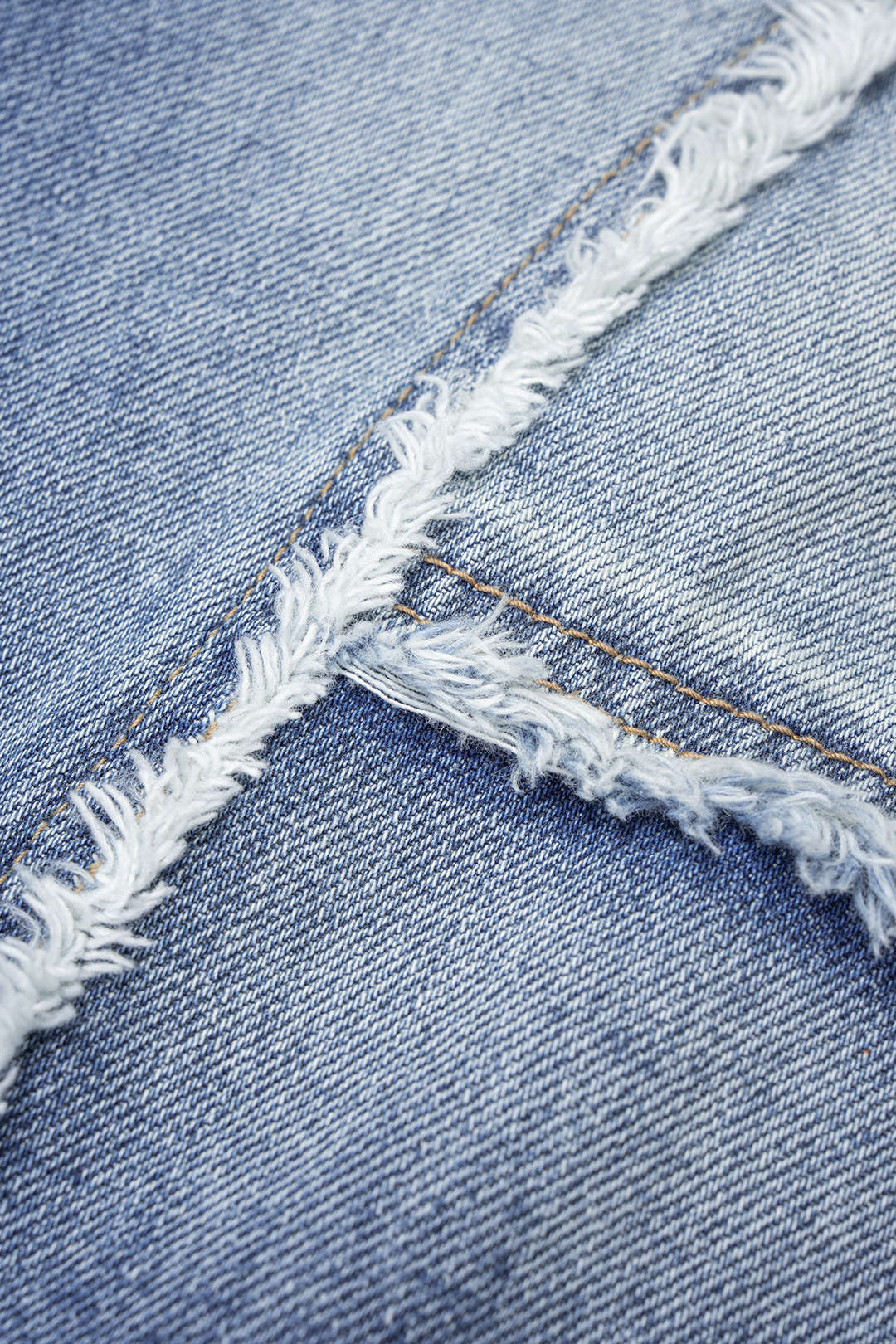 Nora - Patchwork jeans met rafelrand