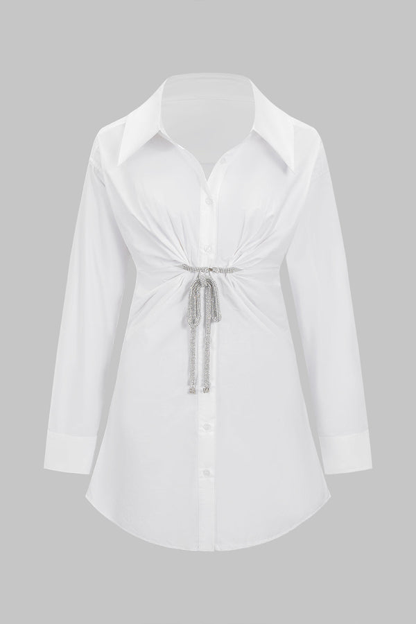 Effen metallic minijurk met knoopjes en lange mouwen