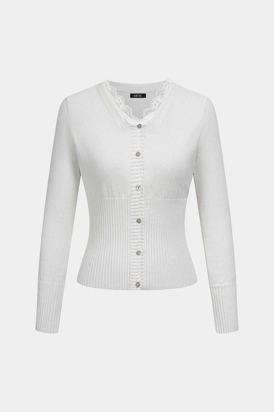 Gebreide patchwork top met kanten rand en knoopjes