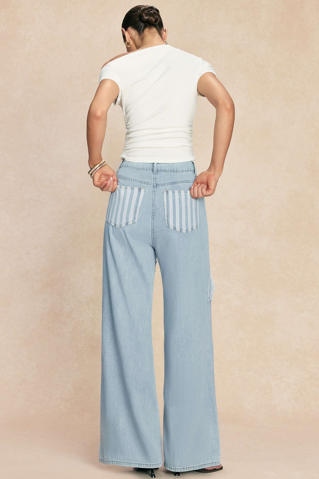 Patchwork jeans met rafelrand en wijde pijpen
