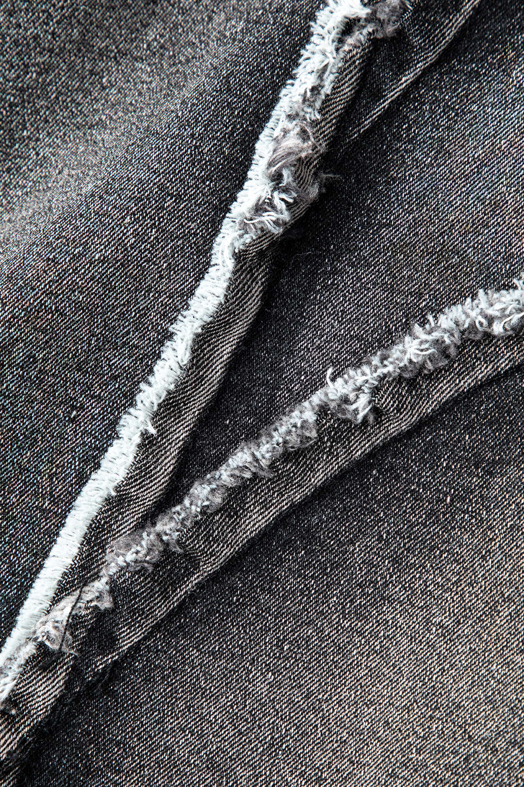 Asymmetrische denim minijurk met rafelrand