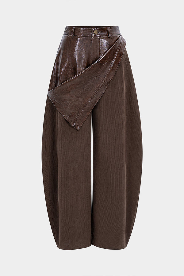 Leren-look patchwork pantalon met rits en wijde pijpen