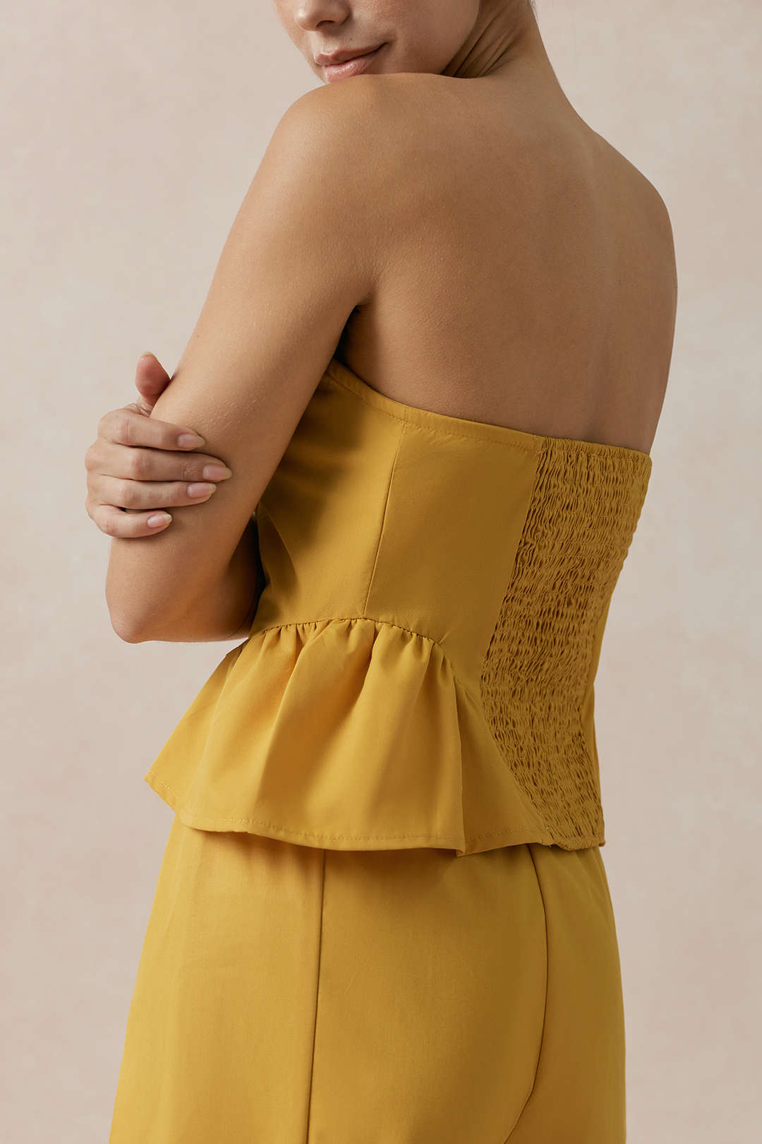 Effen strapless top met ruches en smokwerk