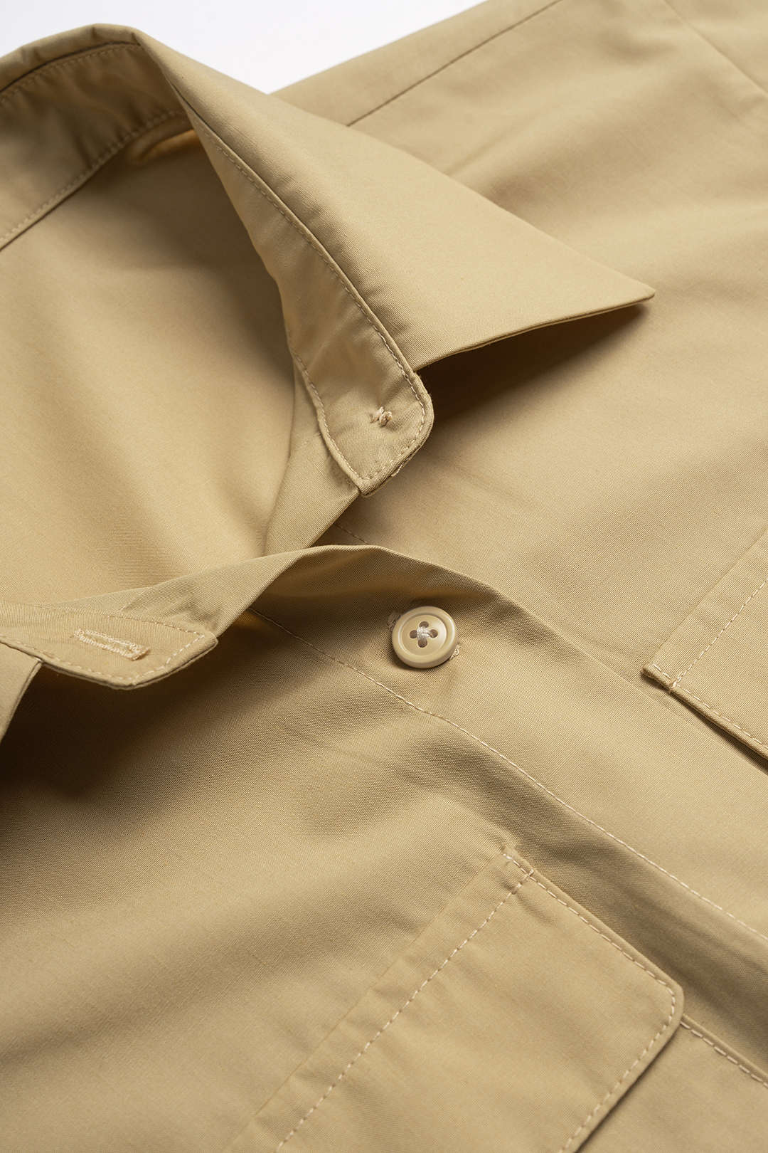 Tanktop met revers, zakken en knoopjes