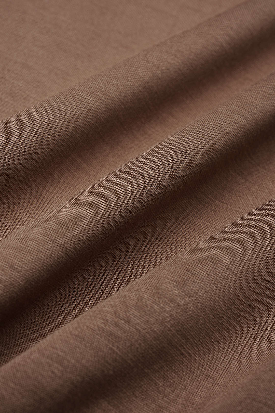 Patchwork leren-look sweater met ronde hals en lange mouwen