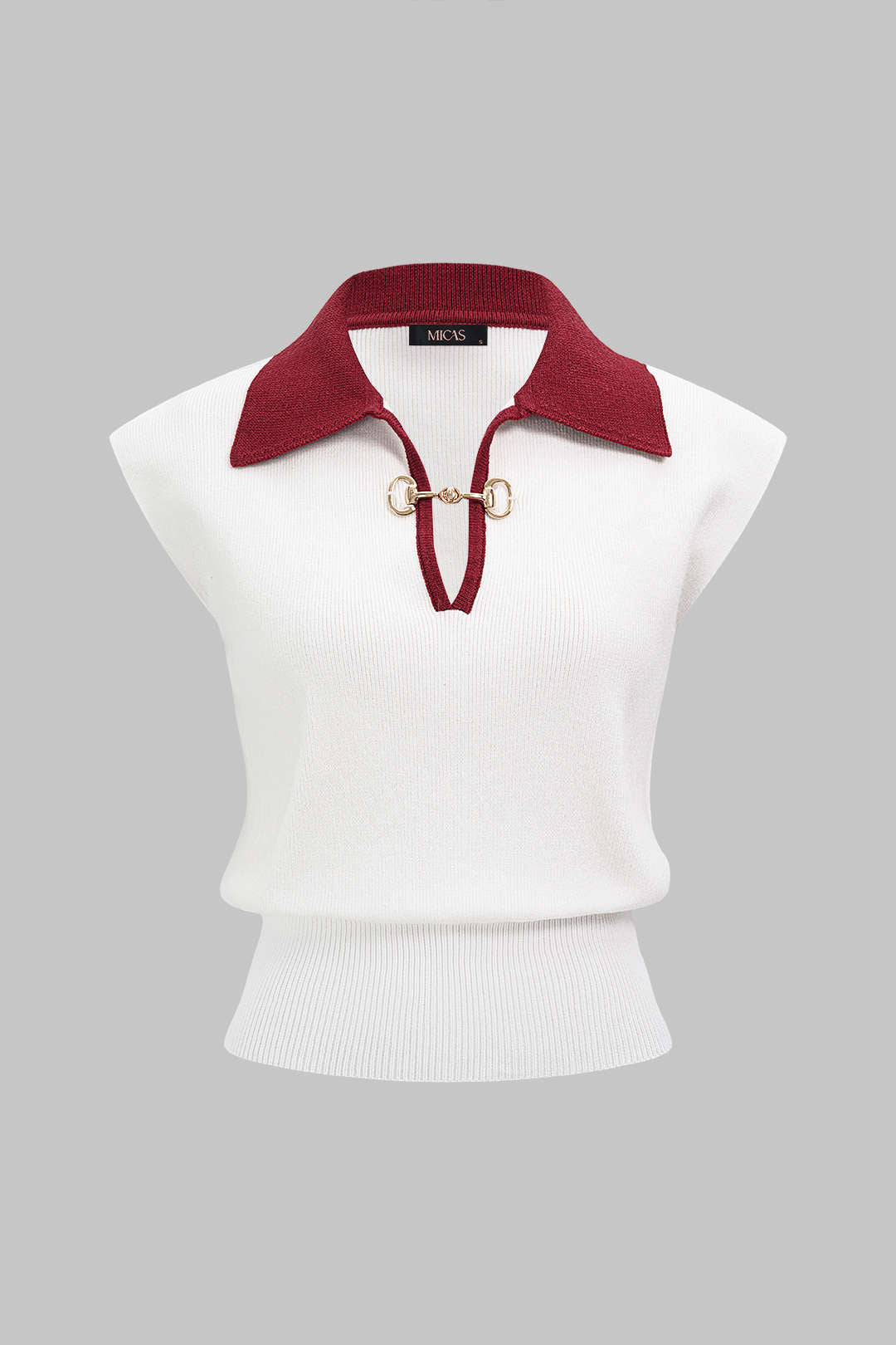 Gebreide metallic tanktop met uitsnijding
