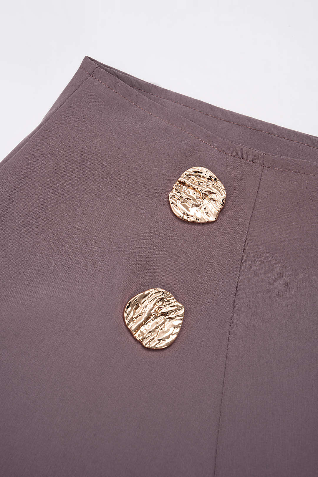 Effen metallic rok met knoopjes, hoge taille en A-lijn