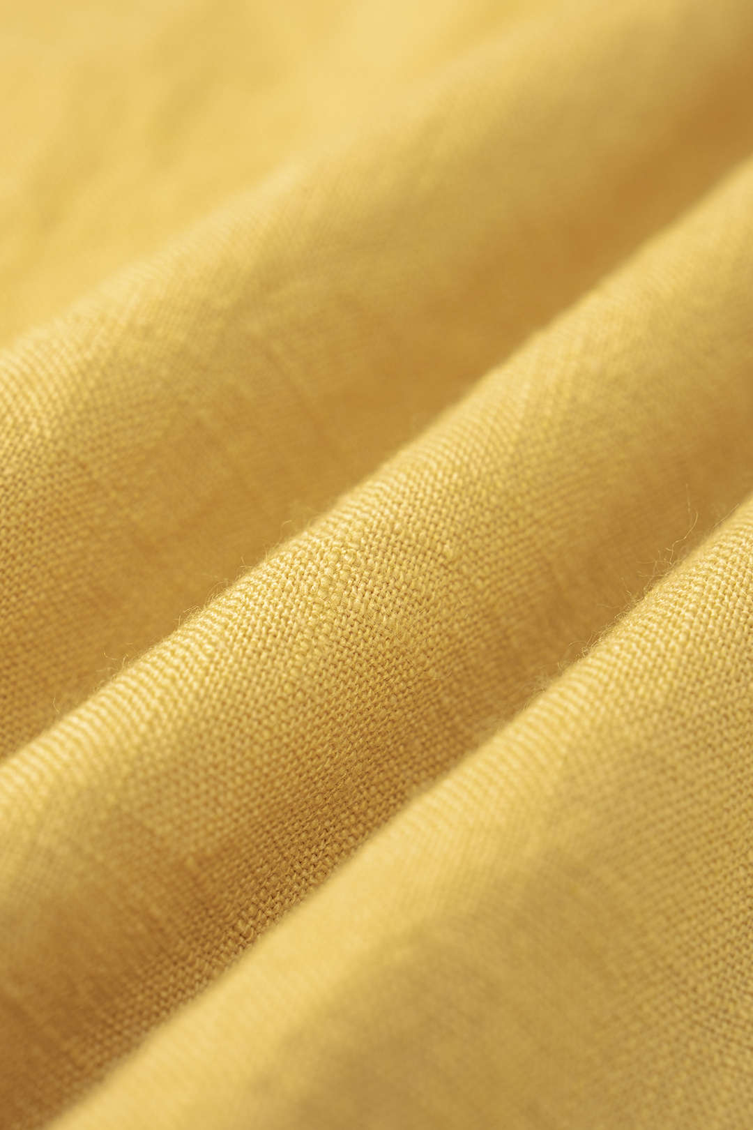 Broek met knoopjes, zakken en strik