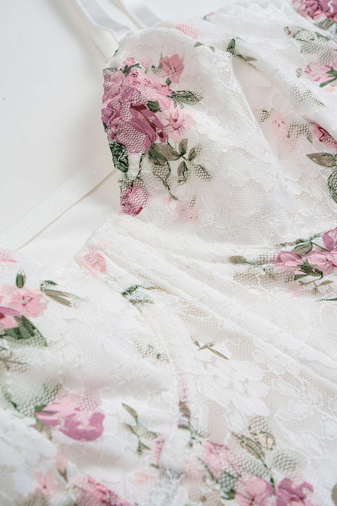 Bloemenprint transparante body met spaghettibandjes