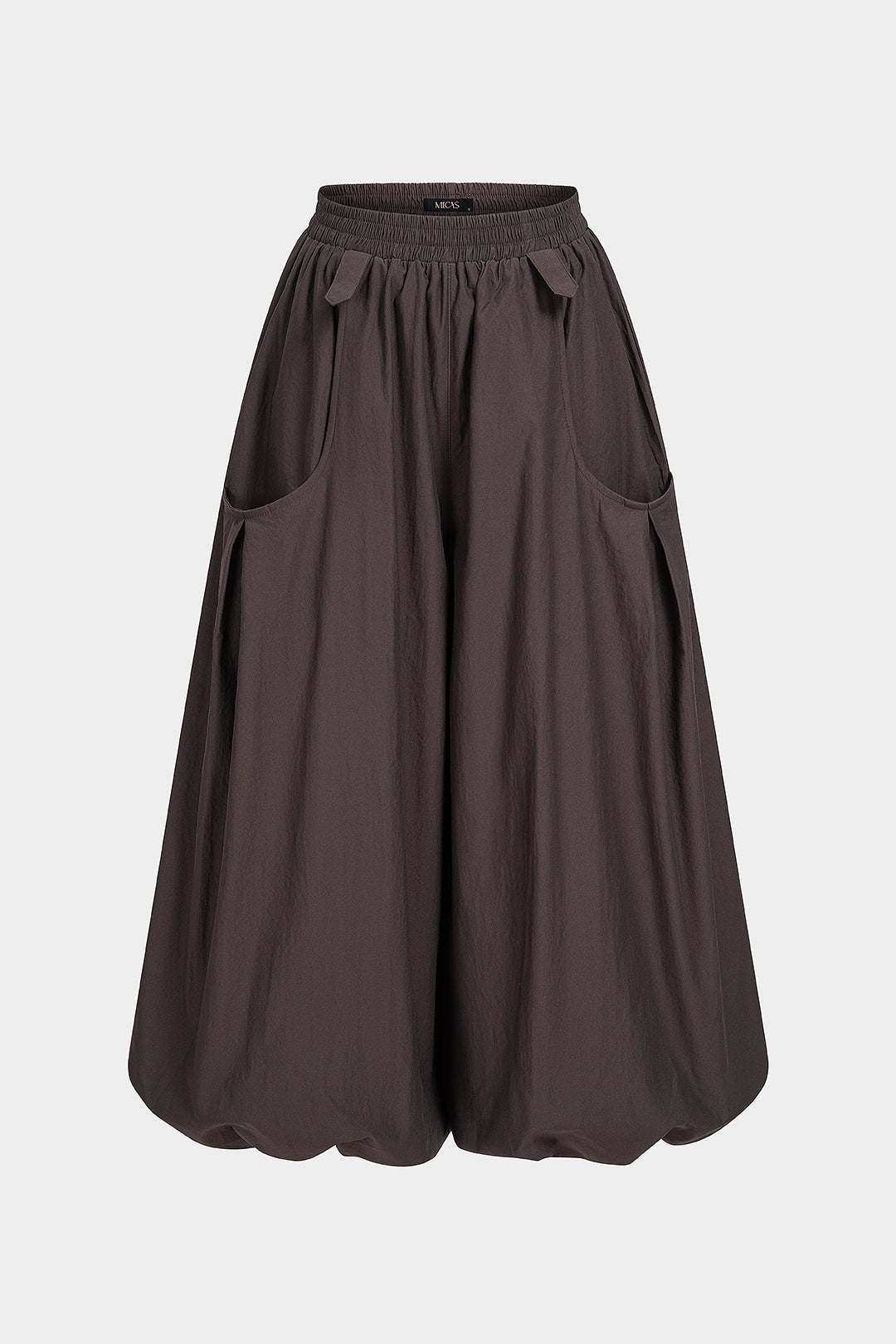 Effen broek met smokwerk en ballonmodel