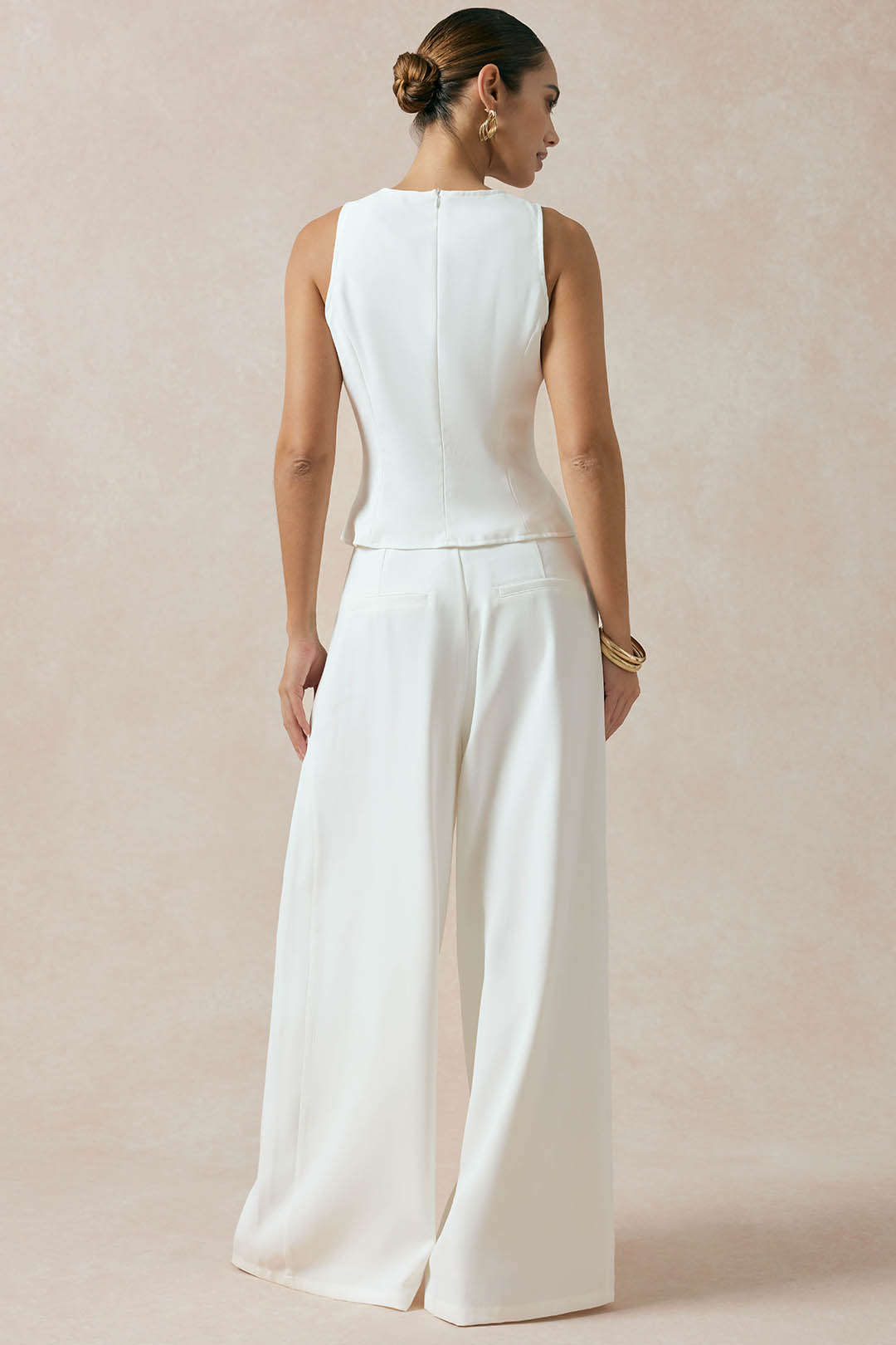 Asymmetrische tanktop met uitsnijding en knoopjes