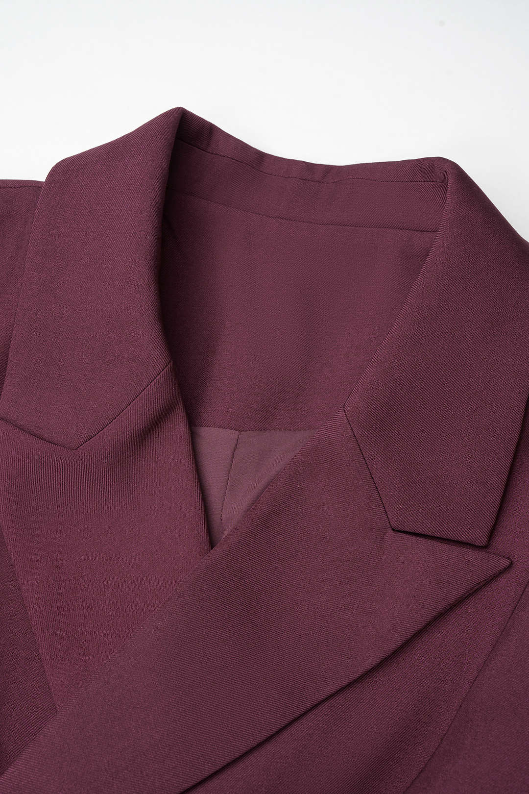 Metallic minijurk met reverskraag, knoopjes en ruches