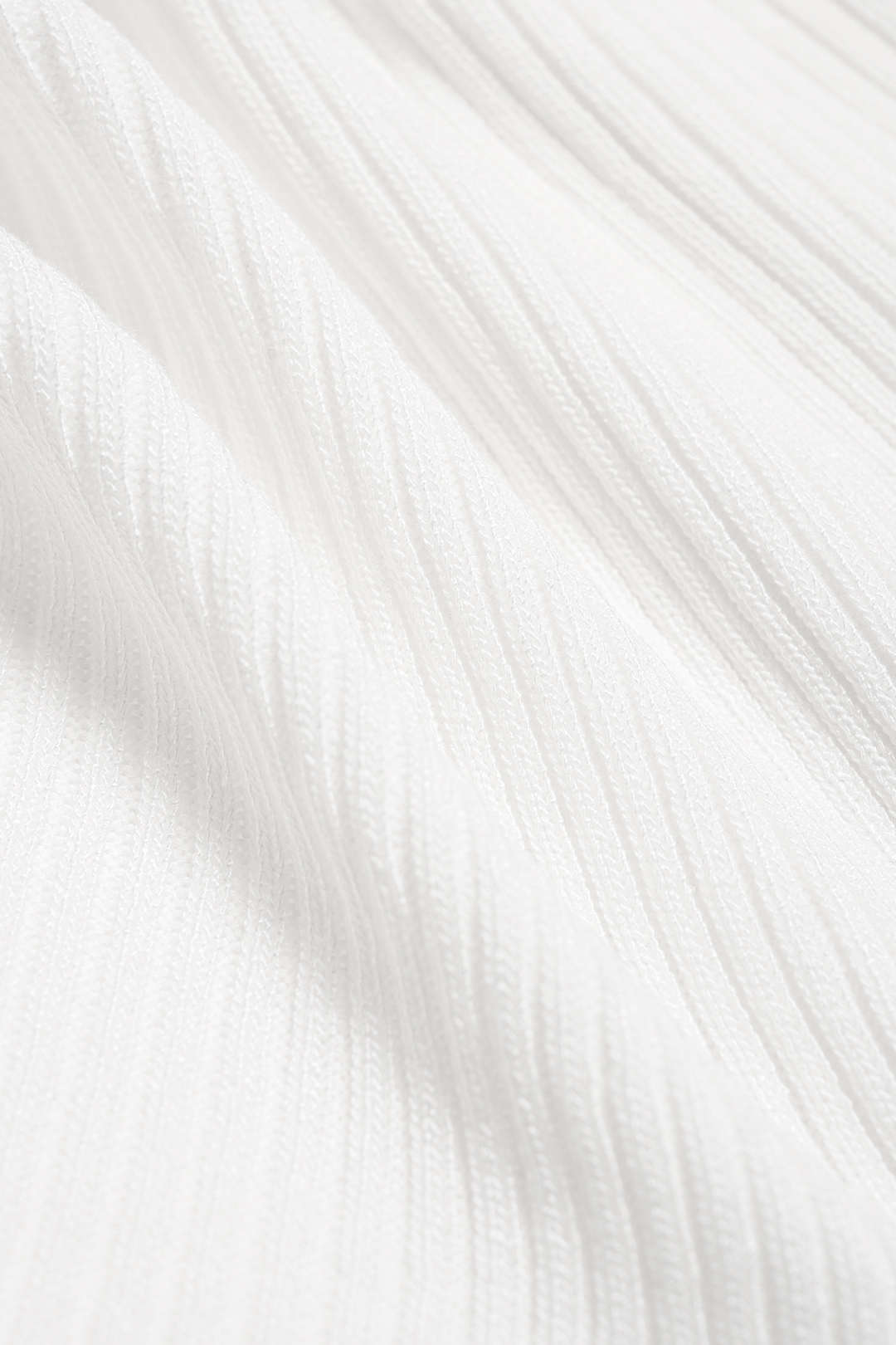 Vesna - Gebreide top met V-hals, gedraaid detail en knoopdetail