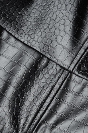 Elise - Leren-look patchwork minijurk met V-hals en ruches