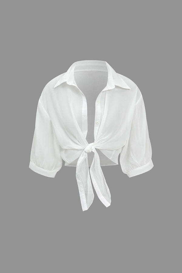 Chiffon blouse met knoopjes, strik en korte mouwen