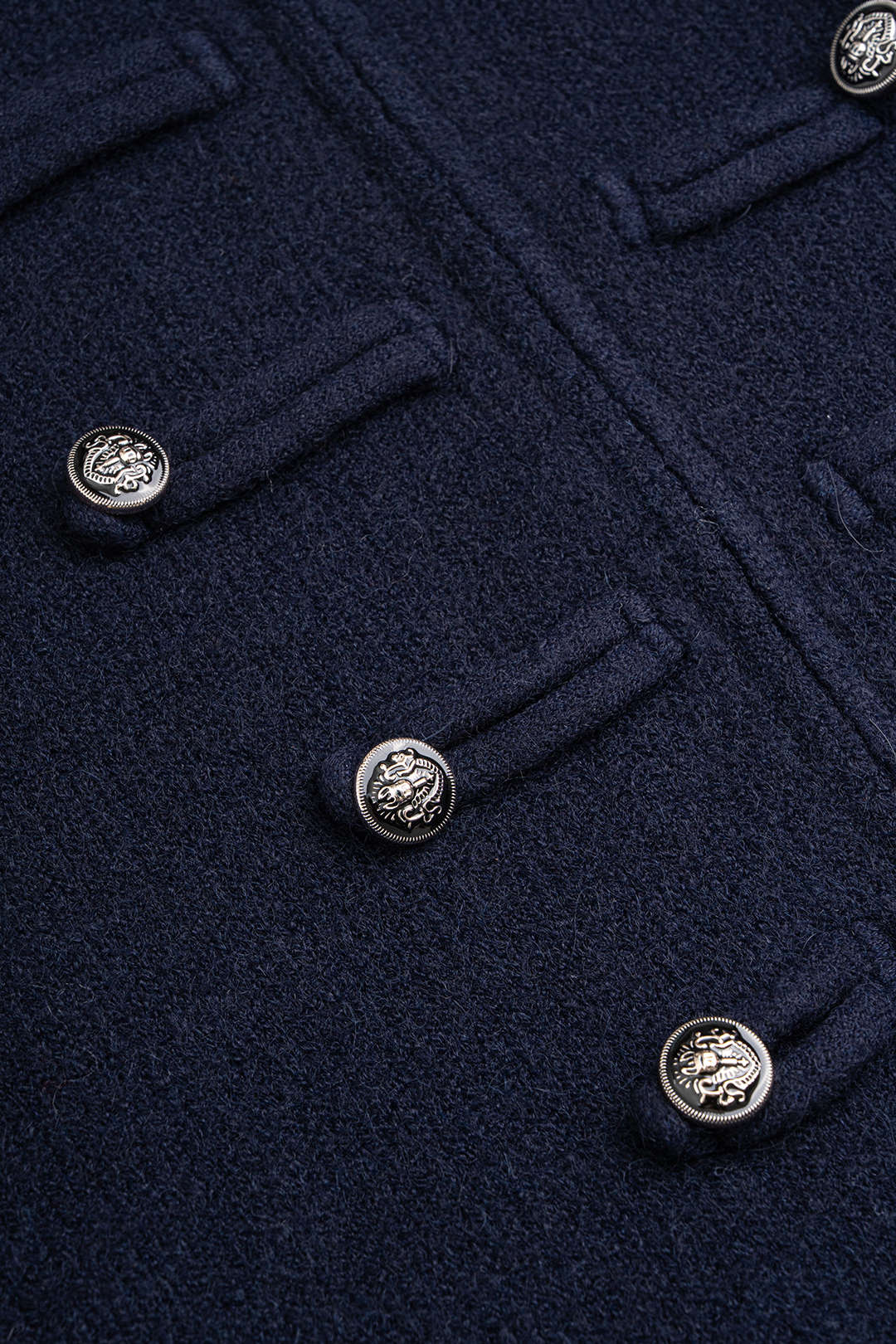 Gebreid vest met rits, knoopjes en dubbele knopenrij