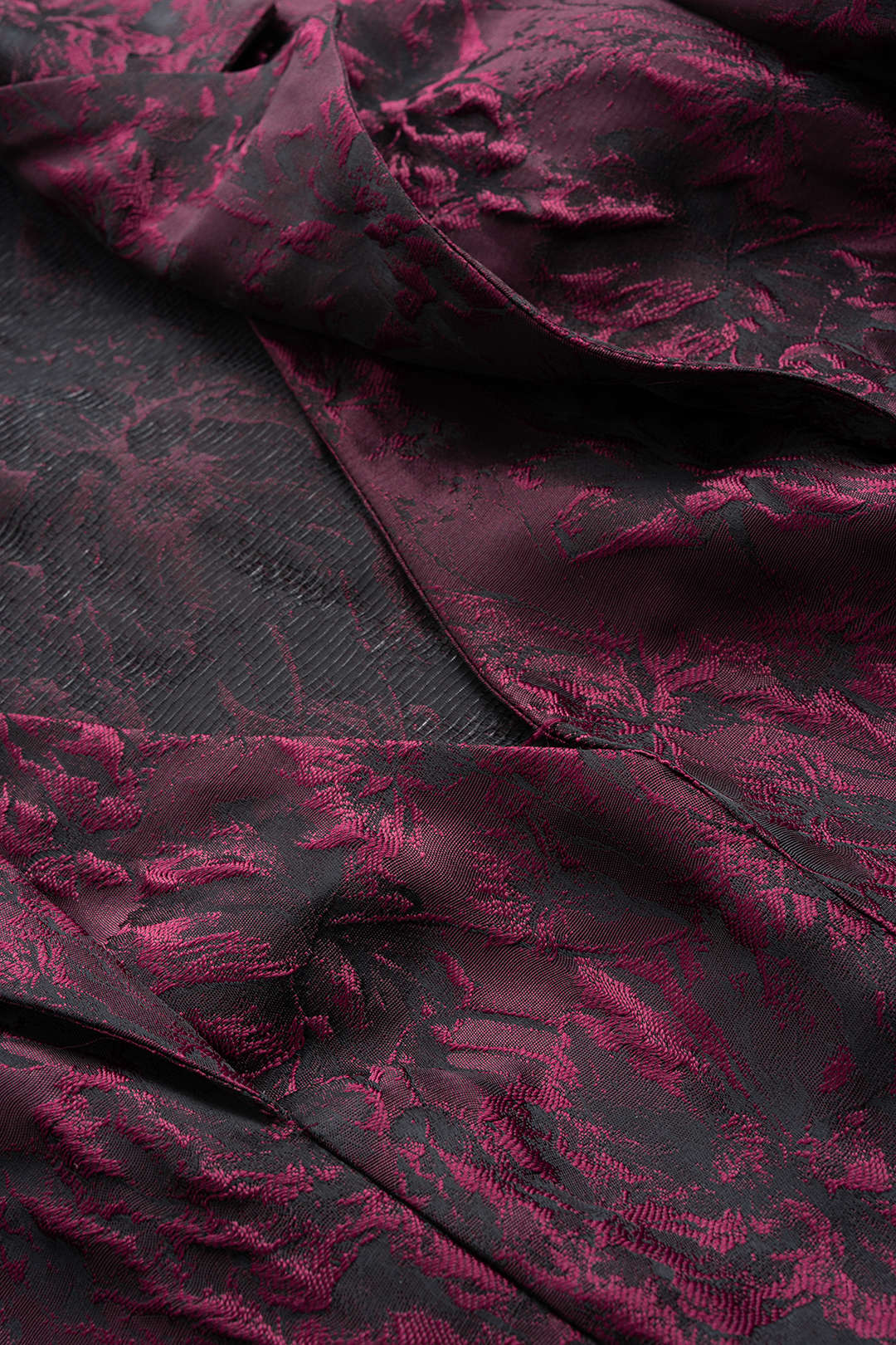 Bloemenprint jacquard body met reverskraag en lange mouwen