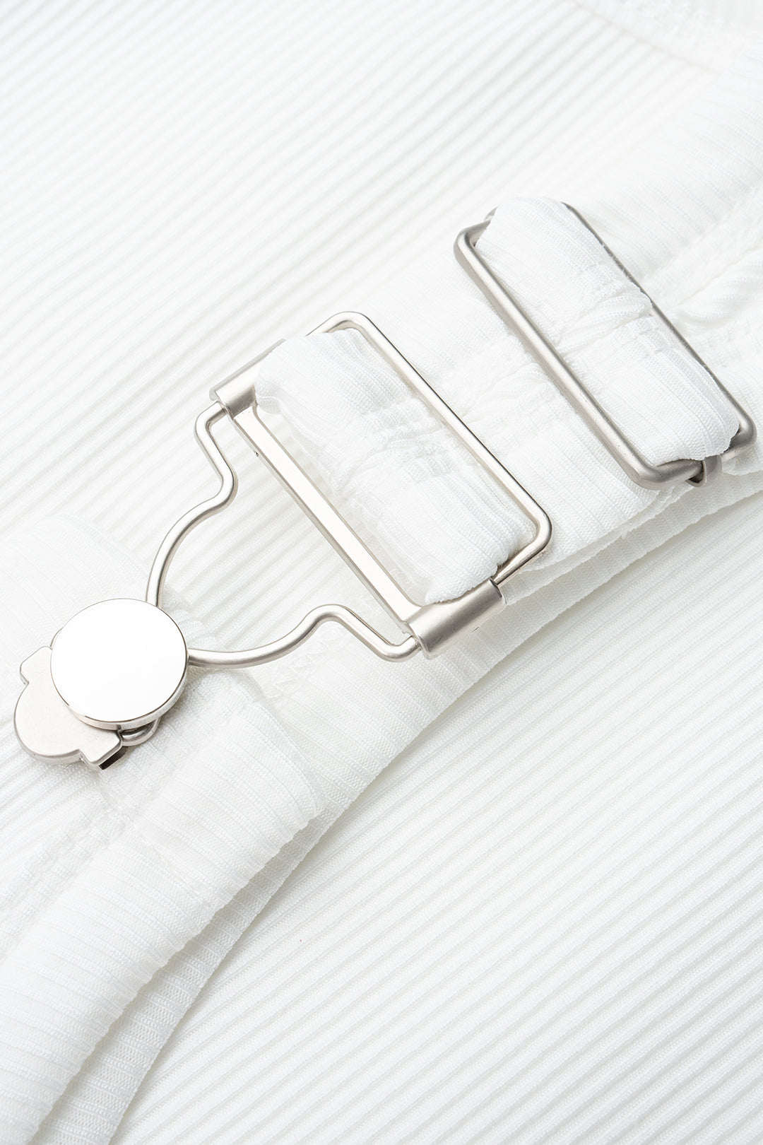 Metallic mouwloze midijurk met ronde hals en gesp