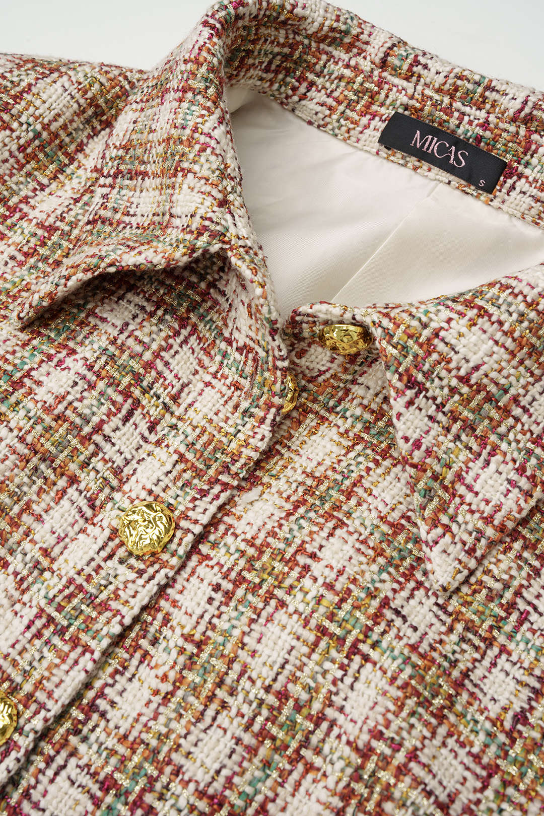 Geometrische wollen blouse met knoopjes en lange mouwen
