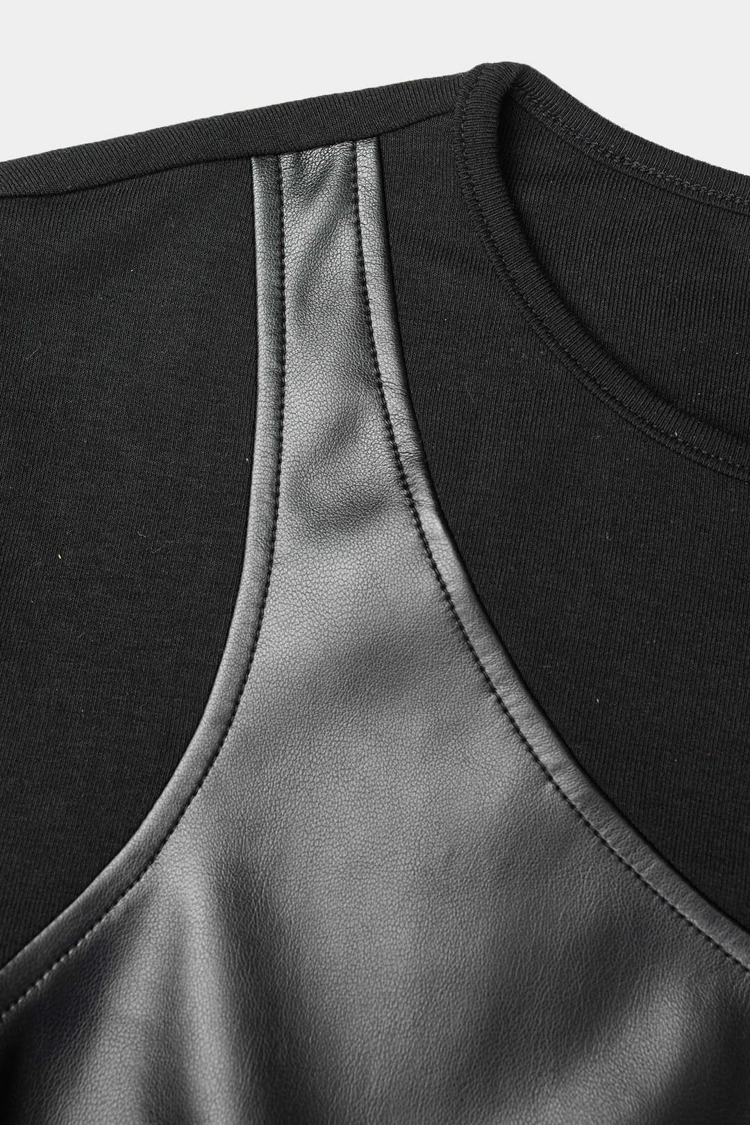 Tara - Leren-look patchwork body met lange mouwen