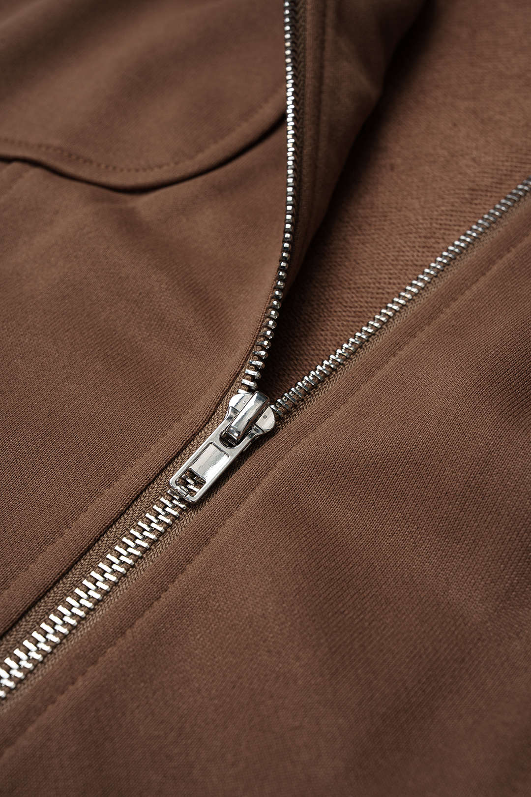Sweater met zakken, riem en rits